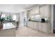 Bright kitchen with stainless steel appliances, granite countertops, and a breakfast bar in an open-concept design at 948 Saint Lyonn Cts, Marietta, GA 30068