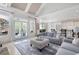 Bright open floor plan with access to kitchen, breakfast area, and outdoor living space at 948 Saint Lyonn Cts, Marietta, GA 30068