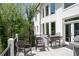 Outdoor deck area with grill, seating and a backyard view at 948 Saint Lyonn Cts, Marietta, GA 30068