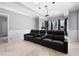 Home theater room featuring tiered seating and large windows with curtains at 948 Saint Lyonn Cts, Marietta, GA 30068