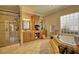 This bathroom features dual vanities, separate tub, and shower with glass door at 2002 Orchard Terrace, Loganville, GA 30052