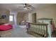 Spacious bedroom showcasing a bed, a dresser, and a pink bean bag at 2002 Orchard Terrace, Loganville, GA 30052