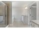 Spacious bathroom featuring double vanity, separate shower and tub at 3925 Cordano Ln, Lawrenceville, GA 30044