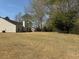 Expansive backyard with mature trees and plenty of space at 4580 Darrowby Dr, Powder Springs, GA 30127