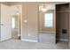 Bedroom with carpet, window, ceiling fan, and closet with mirrored sliding doors at 4580 Darrowby Dr, Powder Springs, GA 30127