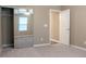 Bedroom with carpet and closet with mirrored sliding doors at 4580 Darrowby Dr, Powder Springs, GA 30127