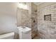 Updated bathroom featuring a tiled shower with a recessed shelf at 1237 Samuel St, Marietta, GA 30008