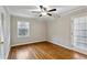 Bedroom with hardwood floors, ceiling fan, and natural light at 1237 Samuel St, Marietta, GA 30008