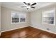 Sunlit bedroom with windows and hardwood floors, creating a warm and inviting space at 1237 Samuel St, Marietta, GA 30008