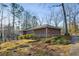 Brick home featuring mature landscaping and a classic architectural style, providing a serene and inviting atmosphere at 1237 Samuel St, Marietta, GA 30008