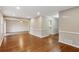 Open-concept living space with hardwood floors, neutral paint, and recessed lighting, ideal for modern living at 1237 Samuel St, Marietta, GA 30008