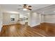 Open-concept living area flowing into the kitchen with wood floors and neutral wall colors at 1237 Samuel St, Marietta, GA 30008