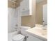 Compact bathroom showcasing a tub-shower combo, vanity, and toilet, ideal for functionality and space-saving at 7810 Rose Ct, Cumming, GA 30040