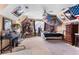Eclectic bedroom filled with decorations, posters, and cozy furniture, creating a unique and personalized space at 7810 Rose Ct, Cumming, GA 30040