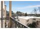 Balcony view featuring a neighborhood, blue sky and mature trees at 2230 Cheshire Bridge Ne Rd # 410, Atlanta, GA 30324