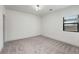 Carpeted bedroom featuring bright lighting and a large window at 2230 Cheshire Bridge Ne Rd # 410, Atlanta, GA 30324