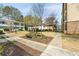 A walkway between buildings with sidewalks and landscaping at 2230 Cheshire Bridge Ne Rd # 410, Atlanta, GA 30324