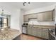 Kitchen featuring granite countertops, stainless steel appliances and gray cabinets at 2230 Cheshire Bridge Ne Rd # 410, Atlanta, GA 30324