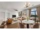 Stylish living space with wood floors, modern furniture, and a dining area near the balcony at 2230 Cheshire Bridge Ne Rd # 410, Atlanta, GA 30324