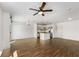 Spacious living room featuring hardwood floors with a view to kitchen at 2230 Cheshire Bridge Ne Rd # 410, Atlanta, GA 30324