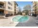 A community pool with lounge chairs and landscaping at 2230 Cheshire Bridge Ne Rd # 410, Atlanta, GA 30324