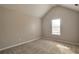 Bedroom with vaulted ceilings, neutral walls, carpet, and natural light at 4410 Millenium View Ct, Snellville, GA 30039