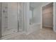 Bathroom featuring glass shower and separate soaking tub at 471 Charleston Pl, Villa Rica, GA 30180