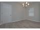 Charming dining area with ample natural light and hardwood flooring at 471 Charleston Pl, Villa Rica, GA 30180
