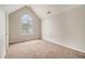 Cozy bedroom with a large window providing natural light and soft carpet flooring at 5080 Galleon Xing, Decatur, GA 30035