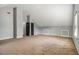 Spacious bonus room with vaulted ceiling, neutral paint, and closet space at 5080 Galleon Xing, Decatur, GA 30035
