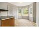 Charming eat-in kitchen with corner windows and stylish flooring at 5080 Galleon Xing, Decatur, GA 30035