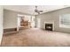 Spacious living room with a fireplace and open access to the kitchen at 5080 Galleon Xing, Decatur, GA 30035