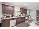 Kitchen features stainless steel appliances, granite countertops, and ample cabinet space at 5140 Cowart Ct, Powder Springs, GA 30127
