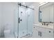 Clean bathroom featuring a glass enclosed shower, sleek vanity and fixtures, and neutral finishes at 1653 Pamela Ne Dr, Brookhaven, GA 30319