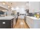 Spacious kitchen with central island, stainless appliances, custom cabinets, and eat-in dining area at 1653 Pamela Ne Dr, Brookhaven, GA 30319