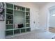 Mudroom features built-in storage, decorative tile, and access to the garage and main house at 1653 Pamela Ne Dr, Brookhaven, GA 30319
