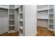 Organized walk-in closet with ample shelving and storage solutions at 1653 Pamela Ne Dr, Brookhaven, GA 30319