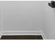 Bathroom detail with wood floor, white walls, and black towel hook at 3048 San Jose Dr, Decatur, GA 30032