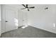 Spacious bedroom featuring overhead lighting, neutral carpeting and a bright window at 3048 San Jose Dr, Decatur, GA 30032
