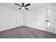 This bedroom is bright, spacious and complete with three closets, overhead lighting and neutral gray carpeting at 3048 San Jose Dr, Decatur, GA 30032