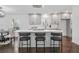 Bright kitchen featuring a breakfast bar with seating, gray cabinets, and stainless steel appliances at 3048 San Jose Dr, Decatur, GA 30032