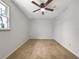 Cozy bedroom with a closet, fan, and neutral carpet at 3686 Sweetbriar Cir, Lithia Springs, GA 30122