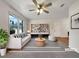 Bright living room showcasing modern furnishings, a stylish rug, and a large window offering ample natural light at 3686 Sweetbriar Cir, Lithia Springs, GA 30122