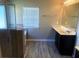 Bathroom with a shower, tub, and good lighting at 6645 Oak Hill Pass, Fairburn, GA 30213