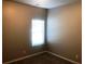 Cozy bedroom with plush carpeting and a window providing natural light at 6645 Oak Hill Pass, Fairburn, GA 30213