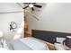 Bright bedroom featuring a ceiling fan, hardwood floors, and modern artistic accents at 1661 La France Ne St # 314, Atlanta, GA 30307