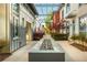 Landscaped courtyard with modern water feature, connecting multiple residential buildings with walkways at 1661 La France Ne St # 314, Atlanta, GA 30307