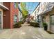 Beautifully landscaped courtyard with walkways between modern buildings at 1661 La France Ne St # 314, Atlanta, GA 30307