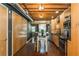 Stylish kitchen featuring stainless steel appliances, light wood cabinets and island, plus industrial-style exposed ductwork at 1661 La France Ne St # 314, Atlanta, GA 30307
