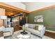 Open-concept living space with exposed beams, modern seating, and an open layout and polished concrete floors at 1661 La France Ne St # 314, Atlanta, GA 30307
